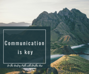 Nature background with "communication is key" 